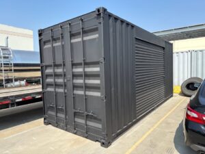 518277105_24084520581203502_1136656330675810502_n.jpg 20ft Used Shipping Container – Matte Black w/ 12’ Side Roll-Up Door